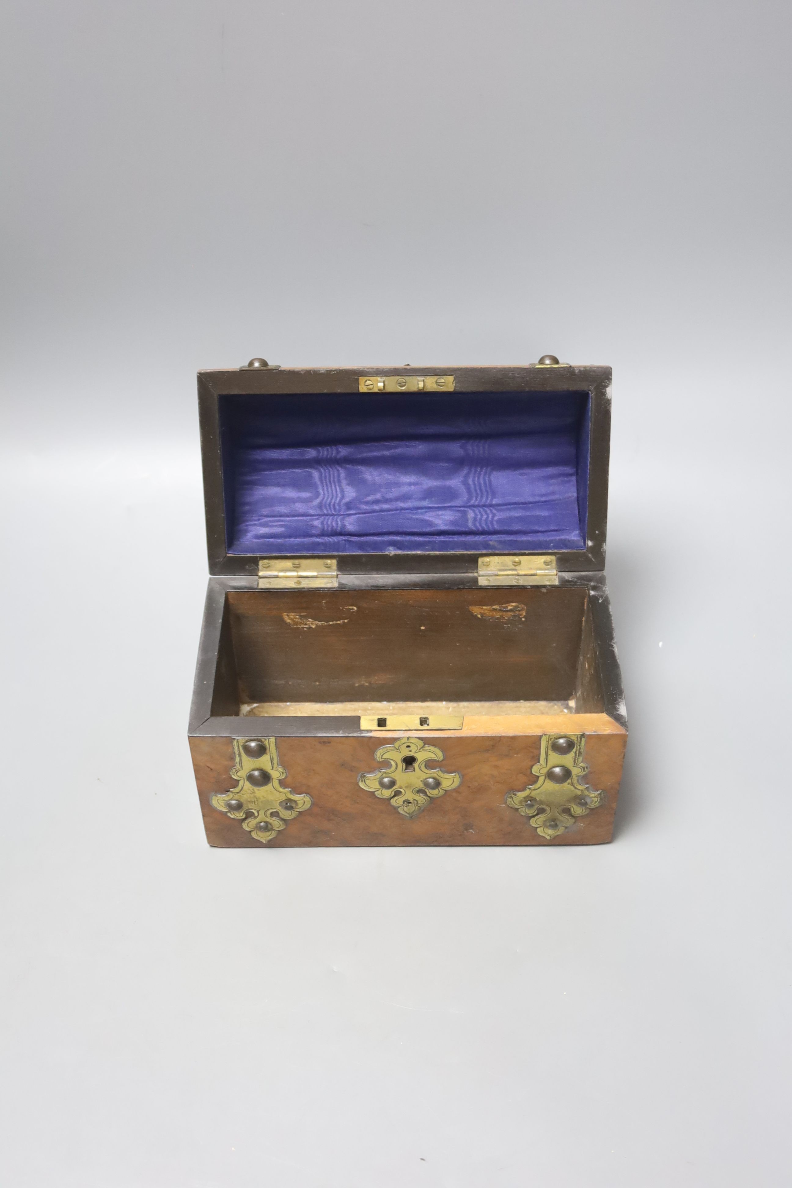 A Victorian rosewood sarcophagus tea caddy, 36.5 cm, a mahogany caddy and a Victorian Walnut and brass mounted casket